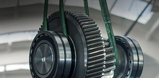 Gearbox being lifted for repairs